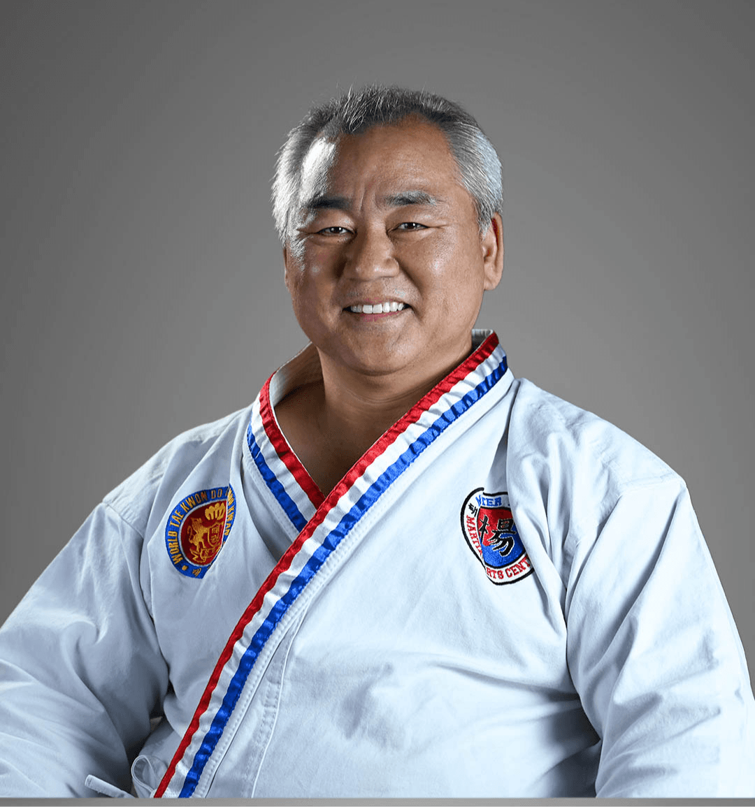 Grandmaster Il Nam Yang in a white dobok